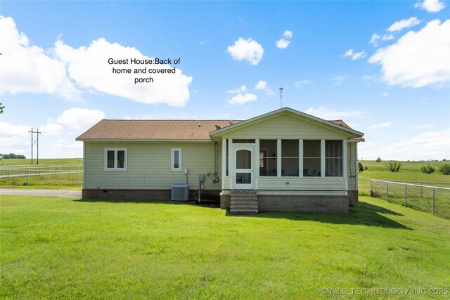4418 N Little, Cushing, OK 74023 - rear view of property with a sunroom, a rural view, and crawl space