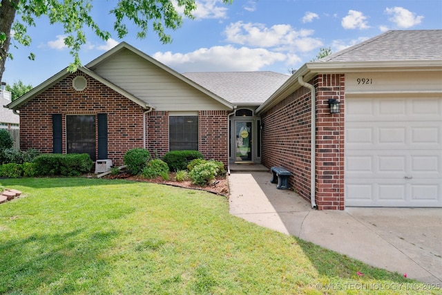9921 N 119th E Ave, Owasso, OK 74055 - ranch-style home with brick siding, a front lawn, a garage, and roof with shingles