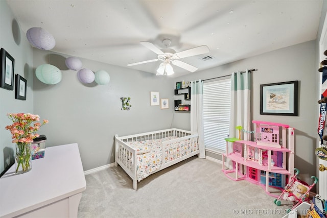 9921 N 119th E Ave, Owasso, OK 74055 - bedroom with carpet flooring, baseboards, and a ceiling fan