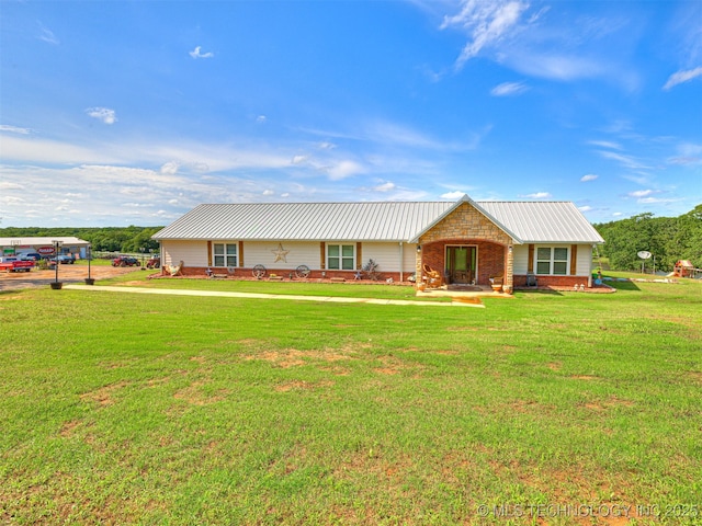 830294 S 3530, Stroud, OK 74079 - single story home featuring metal roof and a front lawn