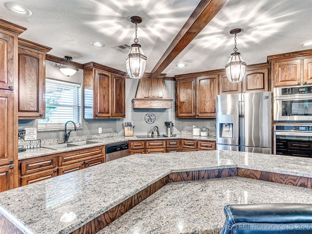 830294 S 3530, Stroud, OK 74079 - kitchen featuring appliances with stainless steel finishes, a sink, custom range hood, recessed lighting, and light stone counters