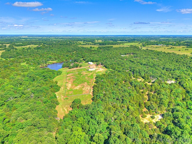 830294 S 3530, Stroud, OK 74079 - aerial view of property's location with a heavily wooded area and a nearby body of water