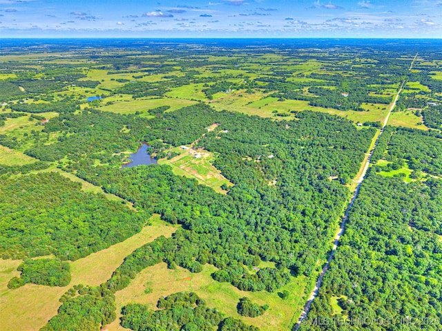 830294 S 3530, Stroud, OK 74079 - aerial view of property and surrounding area with a heavily wooded area and a nearby body of water