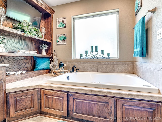 830294 S 3530, Stroud, OK 74079 - full bathroom featuring a bath and a textured wall