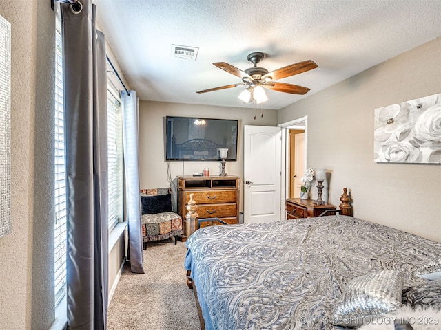 830294 S 3530, Stroud, OK 74079 - carpeted bedroom featuring ceiling fan and a textured ceiling