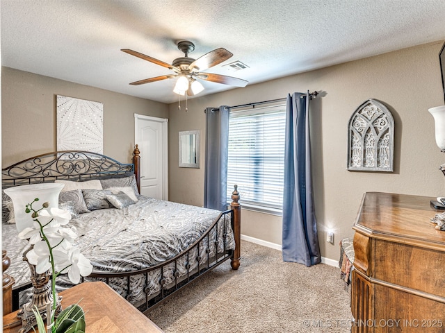 830294 S 3530, Stroud, OK 74079 - carpeted bedroom with a textured ceiling, baseboards, and a ceiling fan