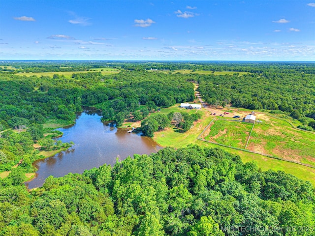 830294 S 3530, Stroud, OK 74079 - aerial view of property's location featuring a heavily wooded area, a nearby body of water, and property boundaries highlighted