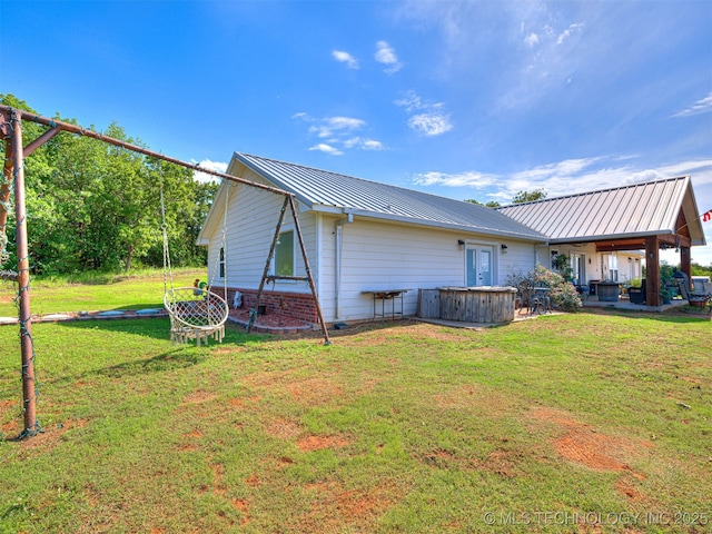 830294 S 3530, Stroud, OK 74079 - back of house featuring metal roof and a lawn