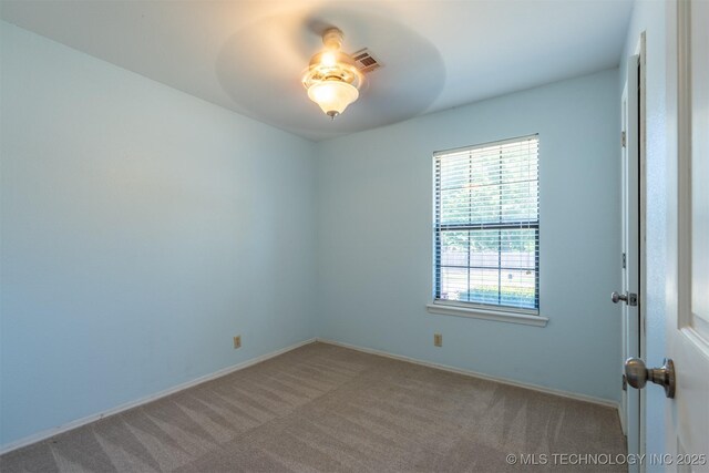 1605 W Montgomery St, Broken Arrow, OK 74012 - empty room with carpet floors and baseboards