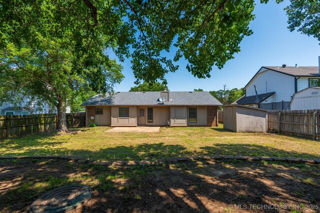 1605 W Montgomery St, Broken Arrow, OK 74012 - back of property featuring a patio area and brick siding