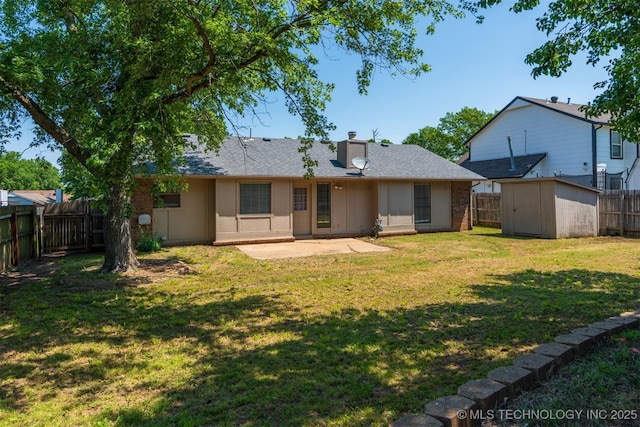 1605 W Montgomery St, Broken Arrow, OK 74012 - rear view of house with a patio area, a chimney, brick siding, and a shingled roof