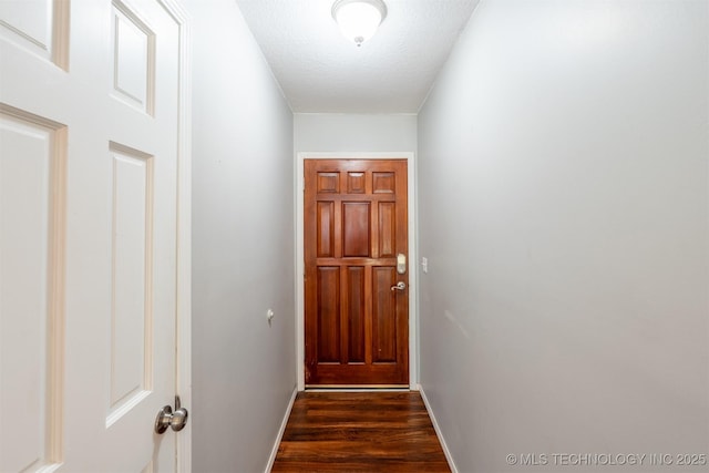 1605 W Montgomery St, Broken Arrow, OK 74012 - entryway with dark wood-style floors and baseboards