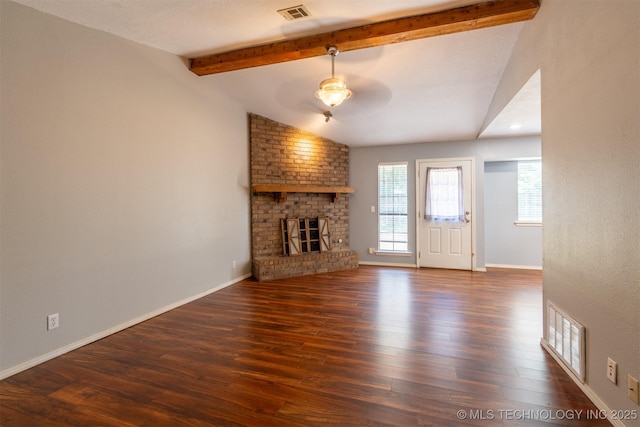 1605 W Montgomery St, Broken Arrow, OK 74012 - unfurnished living room with wood finished floors, a brick fireplace, and baseboards