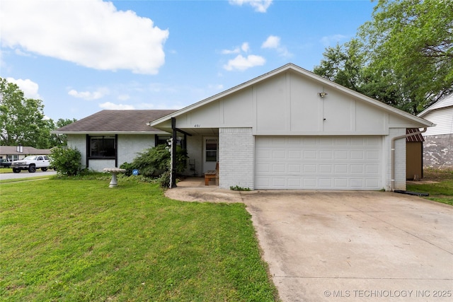 401 W Birmingham St, Broken Arrow, OK 74011 - view of front of home with brick siding, driveway, a front lawn, and a garage