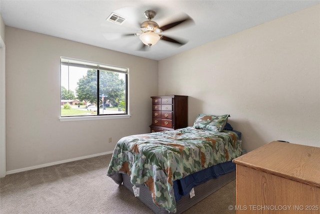 401 W Birmingham St, Broken Arrow, OK 74011 - carpeted bedroom with baseboards and a ceiling fan