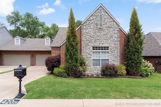 420 Fox Wood Dr, Sapulpa, OK 74066 - view of front facade featuring stone siding, a front yard, driveway, a shingled roof, and an attached garage