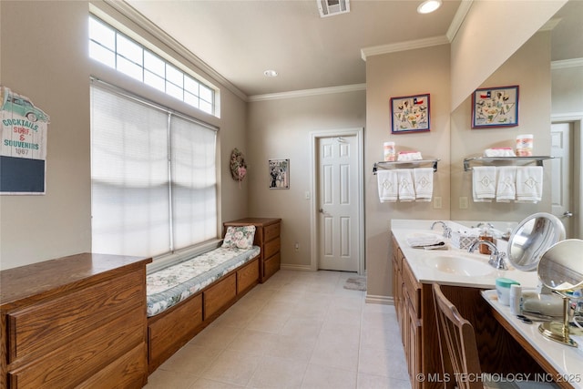 420 Fox Wood Dr, Sapulpa, OK 74066 - bathroom with crown molding, tile patterned flooring, and double vanity