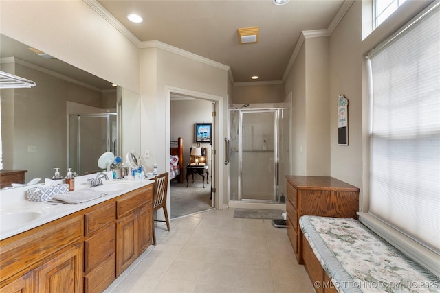 420 Fox Wood Dr, Sapulpa, OK 74066 - bathroom with crown molding, a stall shower, double vanity, and recessed lighting