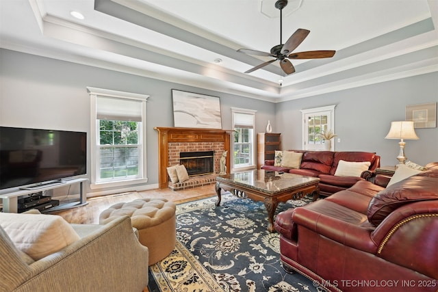 11586 S 66th E Ave, Bixby, OK 74008 - living area with a raised ceiling, ceiling fan, crown molding, healthy amount of natural light, and recessed lighting