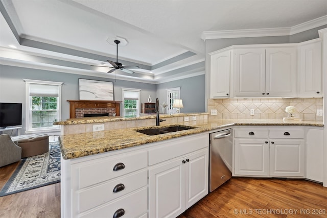 11586 S 66th E Ave, Bixby, OK 74008 - kitchen with a sink, dishwasher, open floor plan, a ceiling fan, and plenty of natural light