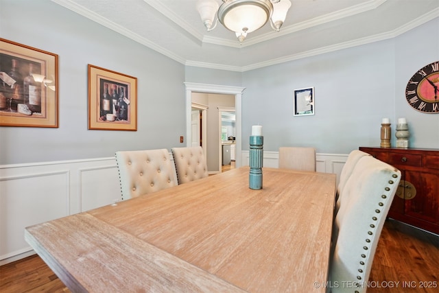 11586 S 66th E Ave, Bixby, OK 74008 - dining room with a chandelier, a decorative wall, ornamental molding, wainscoting, and dark wood-type flooring