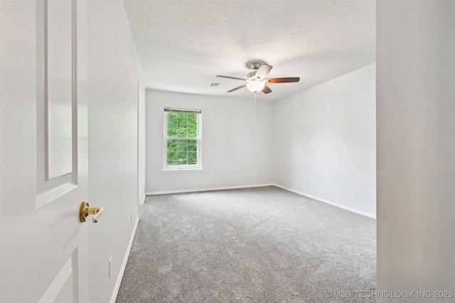 11586 S 66th E Ave, Bixby, OK 74008 - carpeted spare room with a ceiling fan, a textured ceiling, and baseboards