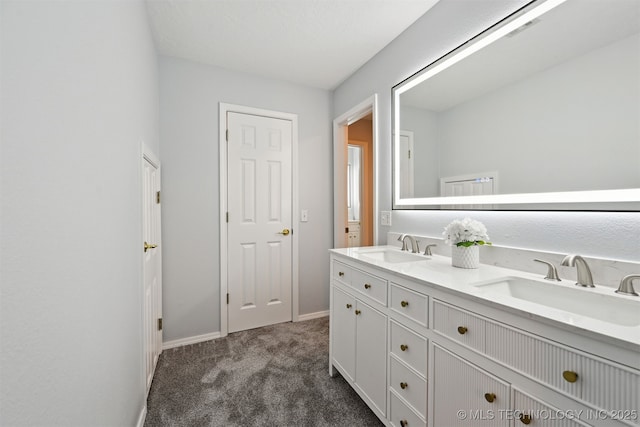 11586 S 66th E Ave, Bixby, OK 74008 - bathroom with double vanity and baseboards
