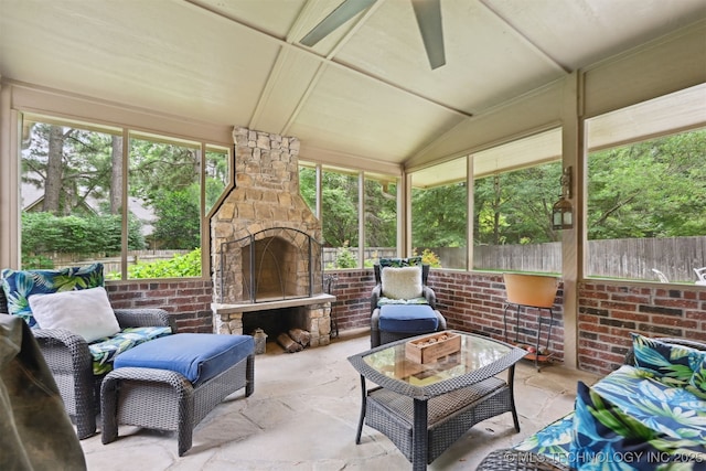 11586 S 66th E Ave, Bixby, OK 74008 - sunroom with vaulted ceiling, ceiling fan, and an outdoor living space with a fireplace