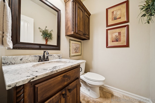13234 S 68th E Ave, Bixby, OK 74008 - bathroom with vanity, toilet, baseboards, and tile patterned flooring