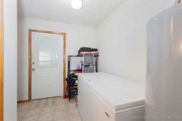 162 Dolittle Ln, Mcalester, OK 74501 - laundry room featuring light tile patterned flooring