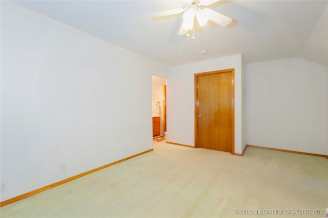 162 Dolittle Ln, Mcalester, OK 74501 - unfurnished bedroom with light carpet, baseboards, a ceiling fan, lofted ceiling, and a closet
