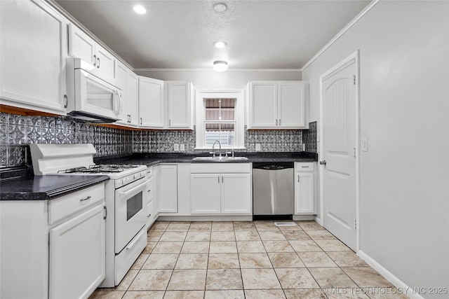 7128 E 5th Pl, Tulsa, OK 74112 - kitchen with white appliances, a sink, tasteful backsplash, white cabinets, and crown molding
