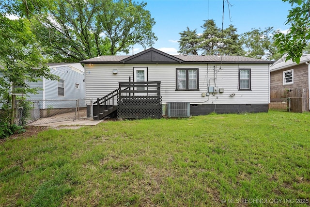 7128 E 5th Pl, Tulsa, OK 74112 - back of property featuring crawl space and a shingled roof