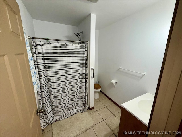 111 Hickory, Durant, OK 74731 - bathroom featuring vanity, toilet, tile patterned floors, and curtained shower