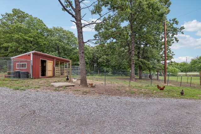 363270 E 5700th Rd, Jennings, OK 74038 - view of yard with an outdoor structure