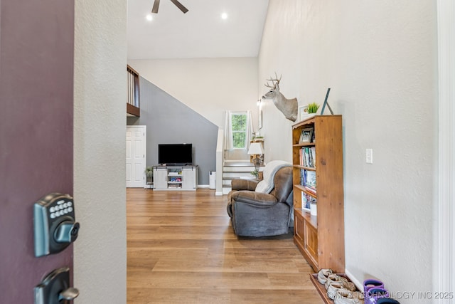 363270 E 5700th Rd, Jennings, OK 74038 - living room featuring ceiling fan, wood finished floors, baseboards, high vaulted ceiling, and recessed lighting