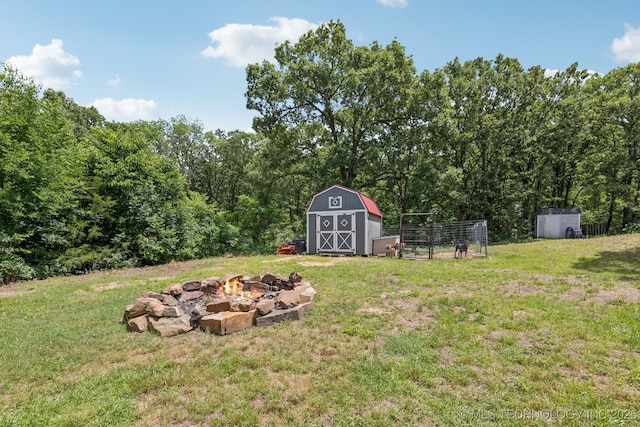 363270 E 5700th Rd, Jennings, OK 74038 - view of grassy yard featuring a fire pit
