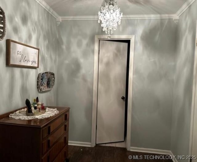 5616 Stonecreek, Durant, OK 74701 - bathroom featuring vanity, a chandelier, ornamental molding, baseboards, and wood finished floors