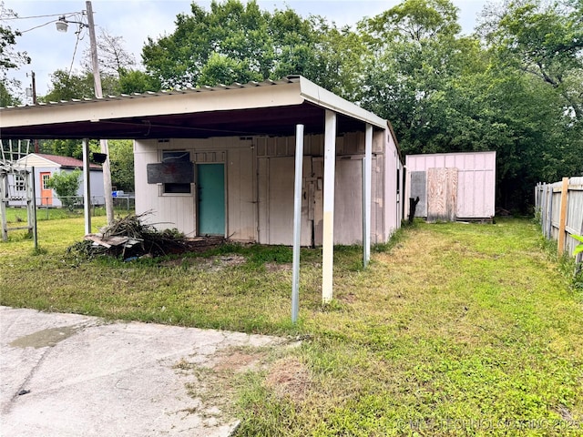 622 H NW, Ardmore, OK 73401 - view of shed featuring a detached carport