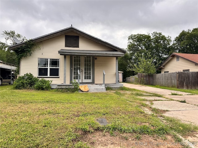 622 H NW, Ardmore, OK 73401 - rear view of house with french doors