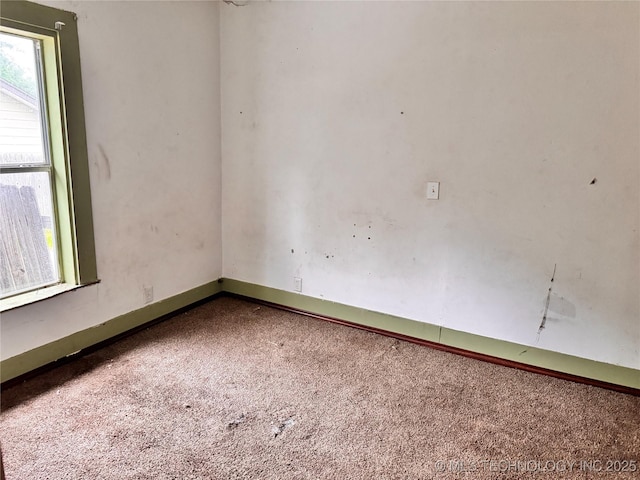 622 H NW, Ardmore, OK 73401 - unfurnished room with carpet floors and baseboards