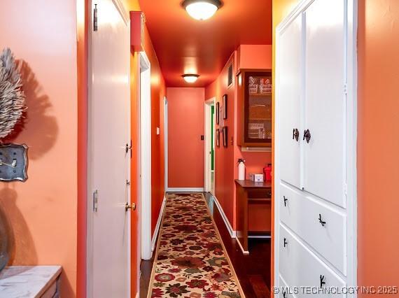 801 S Rennie St, Ada, OK 74820 - hallway with baseboards