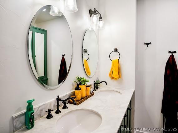 801 S Rennie St, Ada, OK 74820 - bathroom with double vanity