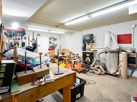 801 S Rennie St, Ada, OK 74820 - garage featuring a workshop area