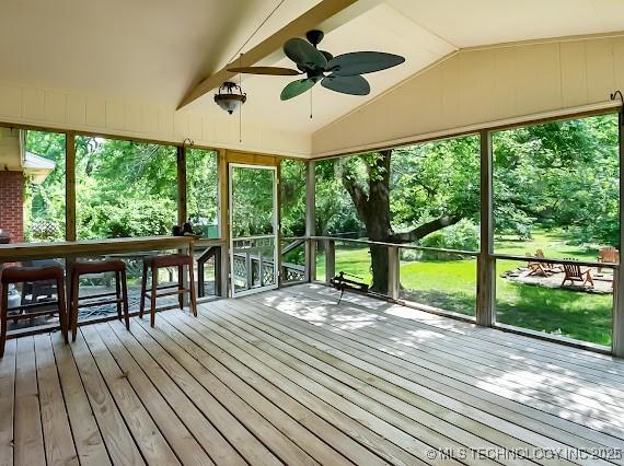 801 S Rennie St, Ada, OK 74820 - unfurnished sunroom with lofted ceiling and a ceiling fan