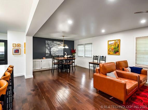 801 S Rennie St, Ada, OK 74820 - living area with dark wood-style floors and recessed lighting