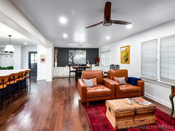 801 S Rennie St, Ada, OK 74820 - living room featuring dark wood-style flooring, ceiling fan, and recessed lighting
