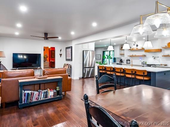801 S Rennie St, Ada, OK 74820 - dining room featuring dark wood finished floors, recessed lighting, and a ceiling fan