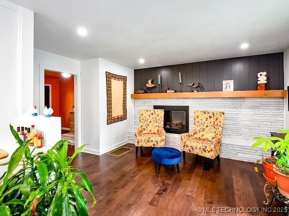 801 S Rennie St, Ada, OK 74820 - living area featuring wood finished floors and recessed lighting