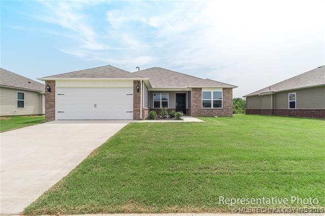 23050 S Mae Dr, Claremore, OK 74019 - single story home with brick siding, a garage, a front yard, and concrete driveway